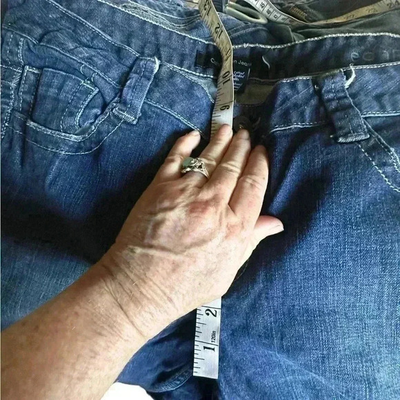 Calvin Klein Size 14 Lean Bootcut jeans.Dark wash.Back flap button pockets. - Picture 10 of 13